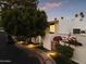 Exterior view of the property featuring an entrance and desert landscaping, highlighting the neighborhood's charm at 4825 N 72Nd Way, Scottsdale, AZ 85251