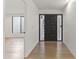 Spacious hallway with hardwood floors and contemporary design at 4825 N 72Nd Way, Scottsdale, AZ 85251