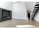 Bright living room with modern fireplace and hardwood floors at 4825 N 72Nd Way, Scottsdale, AZ 85251