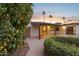 Landscaped backyard with lemon tree and pool access at 4842 E Surrey Ave, Scottsdale, AZ 85254