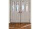 Double front doors with stained glass accents at 4842 E Surrey Ave, Scottsdale, AZ 85254