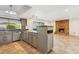 Spacious kitchen with island and stainless steel appliances at 4842 E Surrey Ave, Scottsdale, AZ 85254