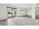 Living room with sliding door to backyard patio at 4842 E Surrey Ave, Scottsdale, AZ 85254