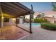 Spacious patio with terracotta tile flooring and pool view at 4842 E Surrey Ave, Scottsdale, AZ 85254