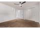 Bedroom with double door closet and carpet at 4963 E Hobart St, Mesa, AZ 85205