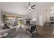 Bright living room featuring a fireplace and access to backyard at 4963 E Hobart St, Mesa, AZ 85205