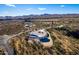 Aerial view of a house with a pool and desert landscape at 51008 N 295Th Ave, Wickenburg, AZ 85390