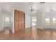 Light and airy bedroom with wood built-ins and laminate floor at 51008 N 295Th Ave, Wickenburg, AZ 85390