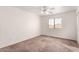 Bright bedroom with ceiling fan and window at 51008 N 295Th Ave, Wickenburg, AZ 85390