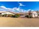 House with desert landscaping and driveway at 51008 N 295Th Ave, Wickenburg, AZ 85390