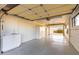 Bright garage featuring a sink and cabinets at 51008 N 295Th Ave, Wickenburg, AZ 85390