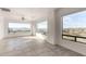 Living room with large windows offering scenic views at 51008 N 295Th Ave, Wickenburg, AZ 85390