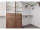 Spacious walk-in closet with shelving and hanging rods at 51008 N 295Th Ave, Wickenburg, AZ 85390