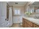 Bathroom with granite countertop, single sink, and tub shower at 5133 W Monte Cristo Ave, Glendale, AZ 85306