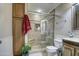 Bathroom with a shower, toilet and granite vanity at 5133 W Monte Cristo Ave, Glendale, AZ 85306