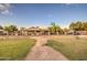 Single-story home with a large backyard and a fenced area at 5133 W Monte Cristo Ave, Glendale, AZ 85306