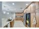 Modern kitchen island with granite countertops and stainless steel appliances at 5133 W Monte Cristo Ave, Glendale, AZ 85306