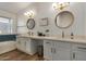 Modern bathroom with double vanity and a soaking tub at 6102 W Whispering Wind Dr, Glendale, AZ 85310