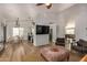 Open living area with a view of the kitchen and seating area at 6102 W Whispering Wind Dr, Glendale, AZ 85310