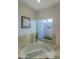 Bathroom with large bathtub and garden view at 6151 E Harvard St, Scottsdale, AZ 85257