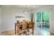 Bright dining area with table and chairs, patio access at 6151 E Harvard St, Scottsdale, AZ 85257