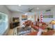 Relaxing living room featuring leather sofas and a large TV at 6151 E Harvard St, Scottsdale, AZ 85257