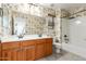 Bathroom with double vanity and tropical wallpaper at 6845 S 7Th Ln, Phoenix, AZ 85041