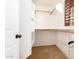 Large walk-in closet with shelves and hanging rods at 6845 S 7Th Ln, Phoenix, AZ 85041