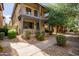 Two-story townhome with front porch and landscaped yard at 6845 S 7Th Ln, Phoenix, AZ 85041