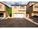 Attached two-car garage with driveway at 6845 S 7Th Ln, Phoenix, AZ 85041