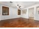 Empty living room with hardwood floors and large windows at 6845 S 7Th Ln, Phoenix, AZ 85041