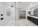 Elegant bathroom with double vanity, walk-in shower, and marble floors at 687 E Cleveland Ct, San Tan Valley, AZ 85140