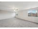 Spacious bedroom with neutral walls, carpet, and ceiling fan at 687 E Cleveland Ct, San Tan Valley, AZ 85140