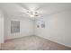 Spacious bedroom with ceiling fan and neutral decor at 687 E Cleveland Ct, San Tan Valley, AZ 85140