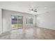 Gathering room with tile floors, sliding door to backyard at 687 E Cleveland Ct, San Tan Valley, AZ 85140