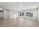 Large living room featuring tile floors and sliding glass doors at 687 E Cleveland Ct, San Tan Valley, AZ 85140