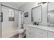 Modern bathroom with white cabinets and a marble countertop at 7860 W Taro Ln, Glendale, AZ 85308