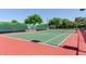 Community tennis court with green surface and netting at 8712 W Sequoia Dr, Peoria, AZ 85382