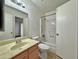 Bathroom features a shower/tub combo and vanity at 8738 W Tinajas Dr, Arizona City, AZ 85123