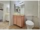 Bathroom with double sinks and toilet at 8738 W Tinajas Dr, Arizona City, AZ 85123