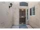 Front entry with security door and neutral-toned walls at 8965 E Maple Dr, Scottsdale, AZ 85255