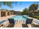 Inviting community pool with lounge chairs and covered seating areas at 8965 E Maple Dr, Scottsdale, AZ 85255