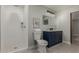 Updated bathroom with a walk-in shower and modern vanity at 1022 E Mariposa St, Phoenix, AZ 85014