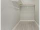 Large walk-in closet with shelving and hanging rods at 1022 E Mariposa St, Phoenix, AZ 85014