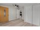 Entryway with yellow door and view to kitchen at 1022 E Mariposa St, Phoenix, AZ 85014