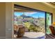 Open patio showcasing beautiful landscaping and desert views at 10567 E Mark Ln, Scottsdale, AZ 85262