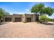 Spacious three-car garage with ample parking on a cobblestone driveway at 10567 E Mark Ln, Scottsdale, AZ 85262