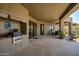 Covered outdoor kitchen and patio with desert plants and views create relaxing backyard retreat at 10567 E Mark Ln, Scottsdale, AZ 85262