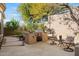 Outdoor kitchen area with built-in grill and seating at 10638 E Blanche Dr, Scottsdale, AZ 85255