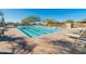 Community lap pool with plenty of lounge chairs at 10638 E Blanche Dr, Scottsdale, AZ 85255